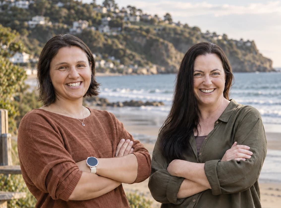 The two directors of Orchid Horizon, standing on the shore in Christchurch.